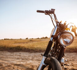 Close Up,view,on,retro,motorcycle,headlights,on,the,desert,background