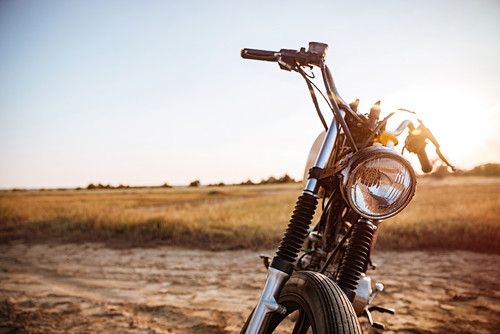 Close Up,view,on,retro,motorcycle,headlights,on,the,desert,background