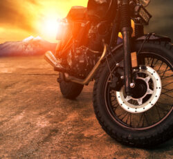Old,retro,motorcycle,and,beautiful,sunset,sky,background
