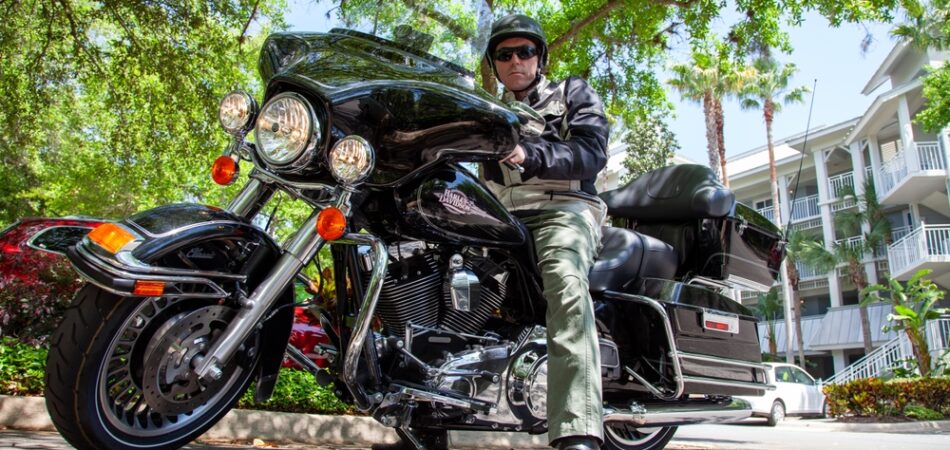 Orlando,,florida,,usa, ,04.04.2011:,male, ,motorcyclist, ,sitting